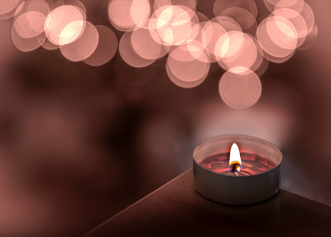Candle With Blurry And Romantic Lights